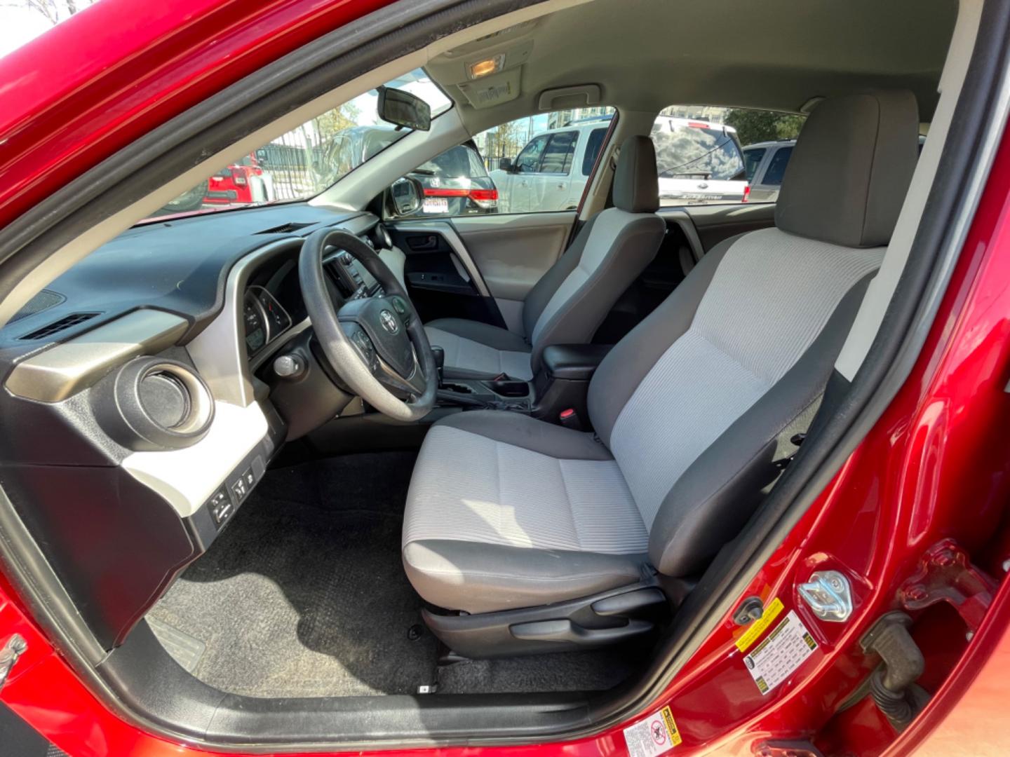 2013 Red /Silver Toyota RAV4 LE (2T3ZFREV0DW) with an 2.5L engine, Automatic transmission, located at 1501 West 15th St., Houston, 77008, (713) 869-2925, 29.797941, -95.411789 - Photo#3